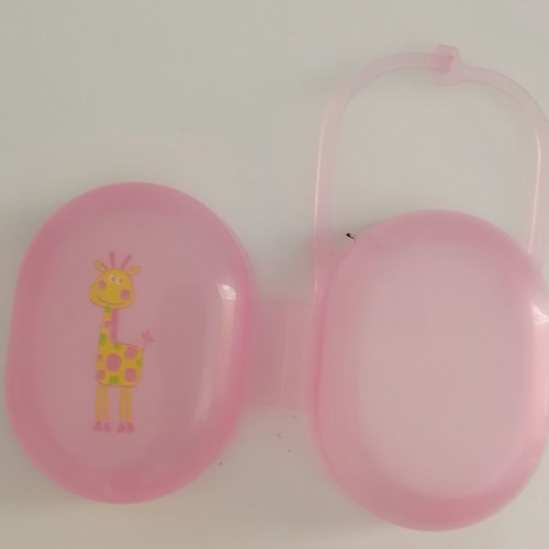 Plastic pacifier case used, pink with giraffe design