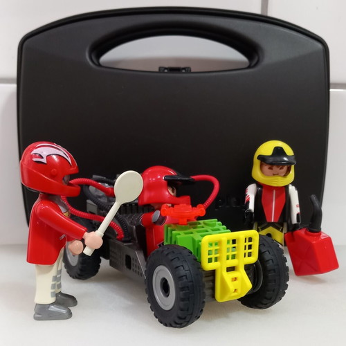 Playmobil car with pull back motion and 3 figures used