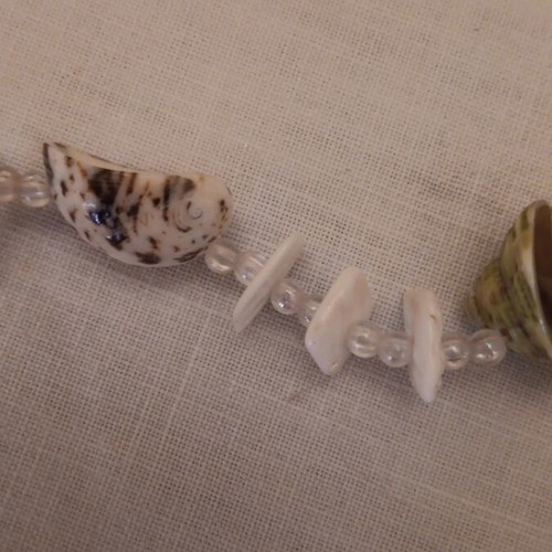 Long necklace made of shells like new, beige and brown