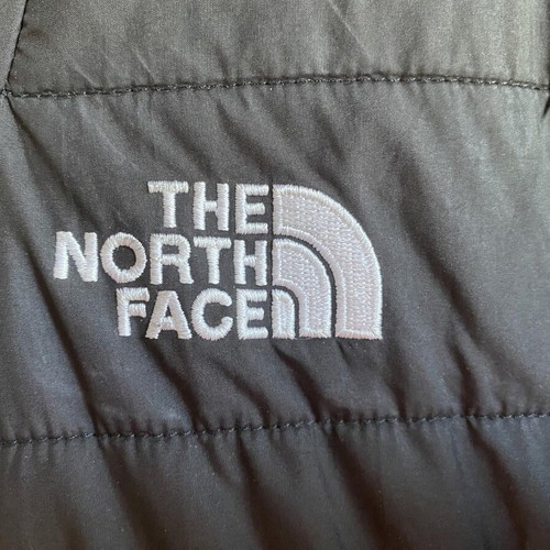 The North Face jacket used, reversible, size S, black and gray