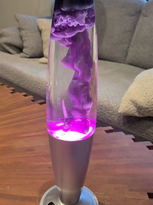 Lava lamp with transparent purple color like new