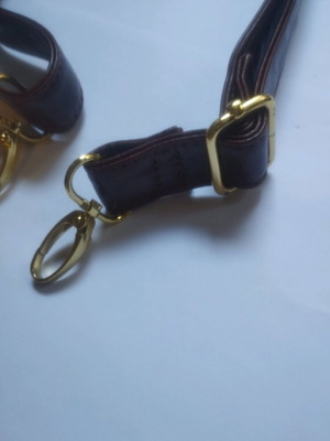 Strap with clips like new, brown leatherette with gold clips