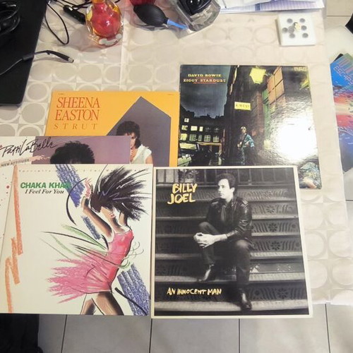 Vinyl records used, pack of about 75 with classic rock artists