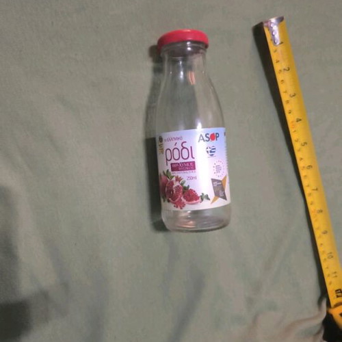 Empty decorative glass bottle like new with cap