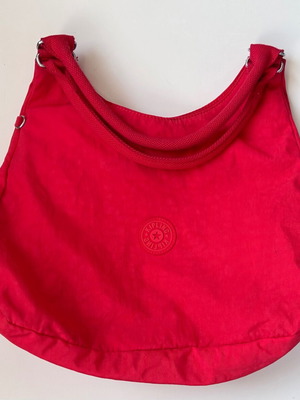 Kipling textile shoulder bag in deep red color like new