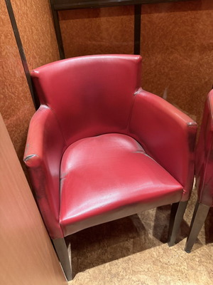 Red armchair with armrests, modern design
