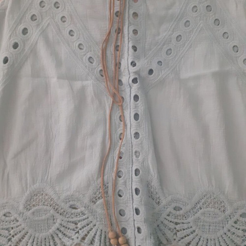 Summer blouse new, blue with decorative feather