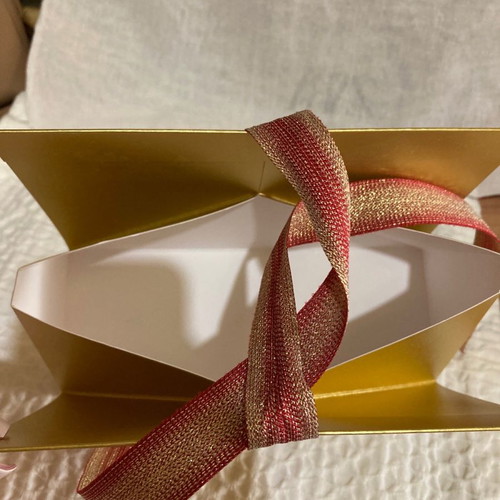 Chanel gift box new in gold color with ribbon