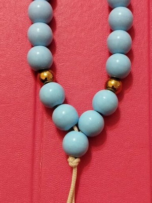 Decorative worry beads blue with an eye