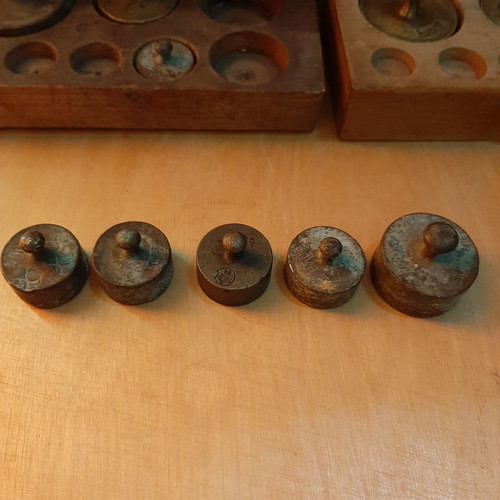 Wooden boxes with used bronze and cast iron scales set