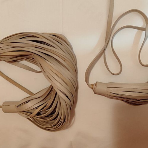 Necklace and bracelet set with leather tassels, beige nude
