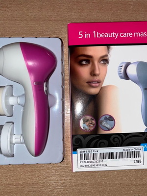 Facial cleansing device new with 2 speeds and 5 attachments