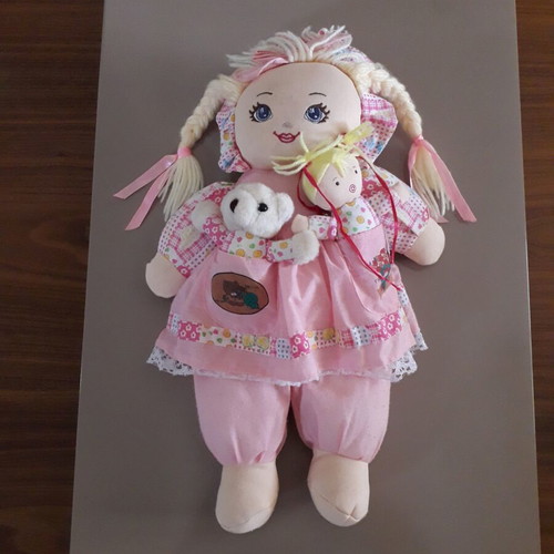 Cloth doll with 2 small dolls