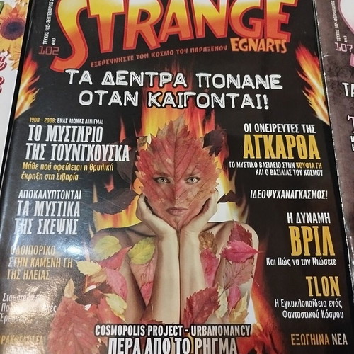 Strange magazine pack of 7 issues with Tesla book like new