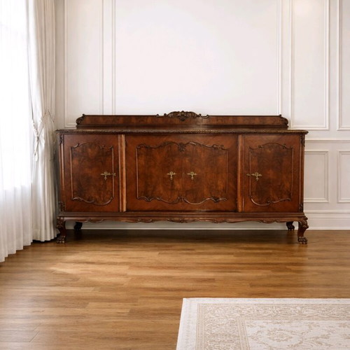 Antique walnut sideboard buffet cabinet used with lion's feet and brass details