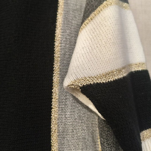 Knitted women's oversized color block sweater with gold detail, like new, one size