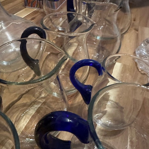 Set of 10 blown glass pitchers like new with cheese platter