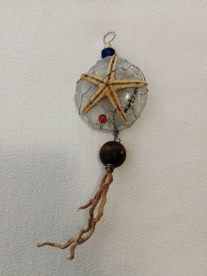 Art micro sculpture used with glass, wood, beads, starfish