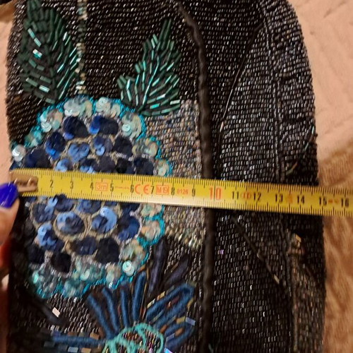 Accessorize evening bag like new with full embroidery