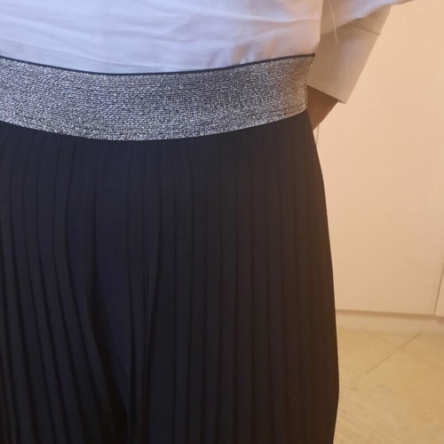Pleated pants black like new with silver band at waist size M