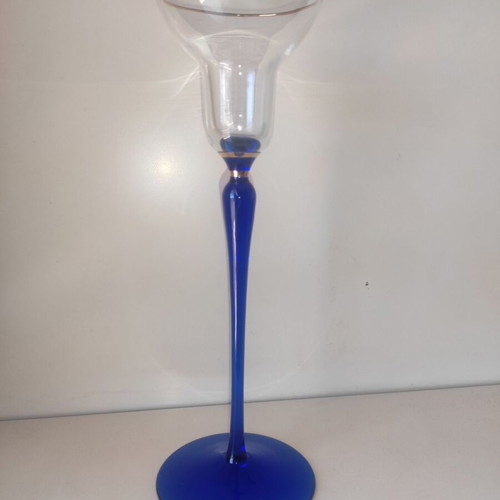 Glass candlestick like new with gilded details
