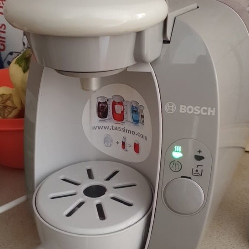 Tassimo espresso coffee machine with cleaning pod