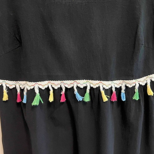 Dress with open back and bow used, black with colorful tassels