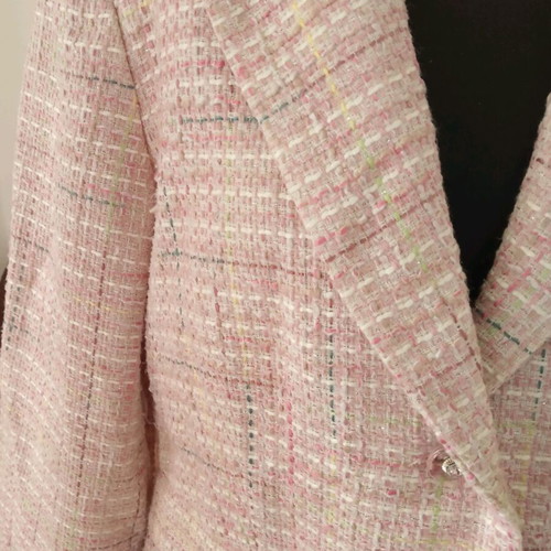 Tweed jacket used with silver thread and boutonniere