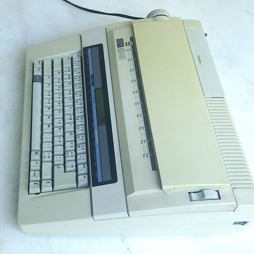 Nakajima AX-65 portable electronic typewriter used, Greek-English