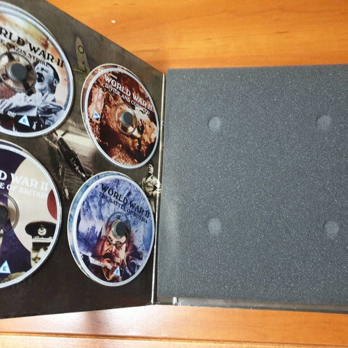 Combat WWII book set and 8 DVD collection used, English