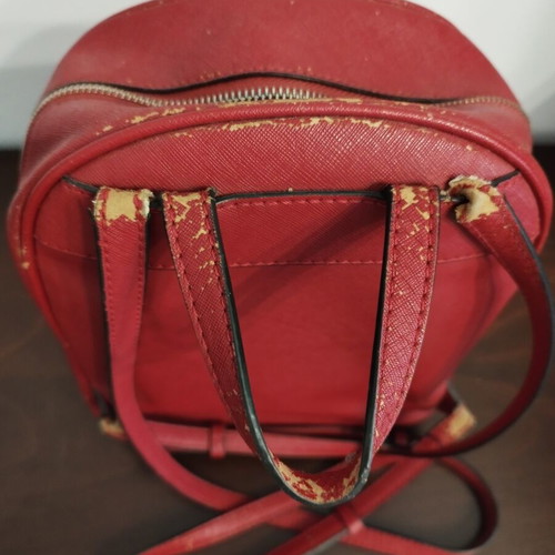 Guess women's red backpack used with wear on edges and straps