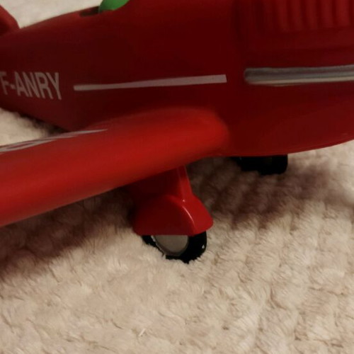 Le Petit Prince figure decorative like new with red airplane