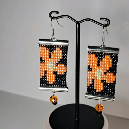 Handmade earrings new with daisies, knitted, black and orange
