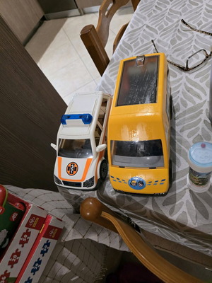 Playmobil school bus and first aid car like new