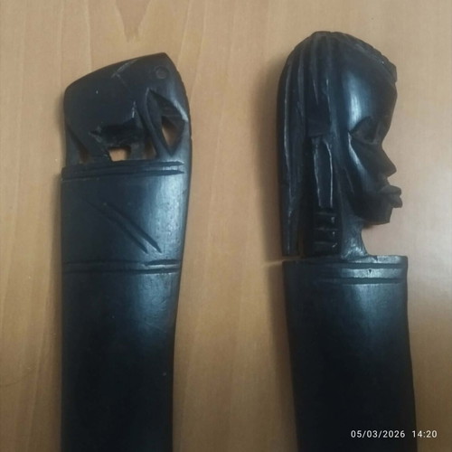 African wooden paper cutters used with elephant and female head design