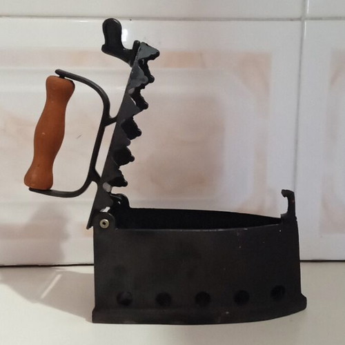 Small charcoal iron decorative like new made in Greece