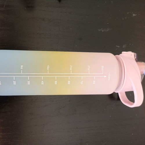 Plastic water bottle 1100ml like new with measurement scale