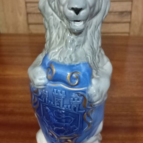 Traditional Ukrainian vodka in porcelain bottle with lion new