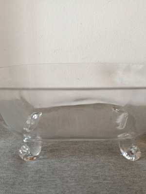 Glass bowl new with four feet