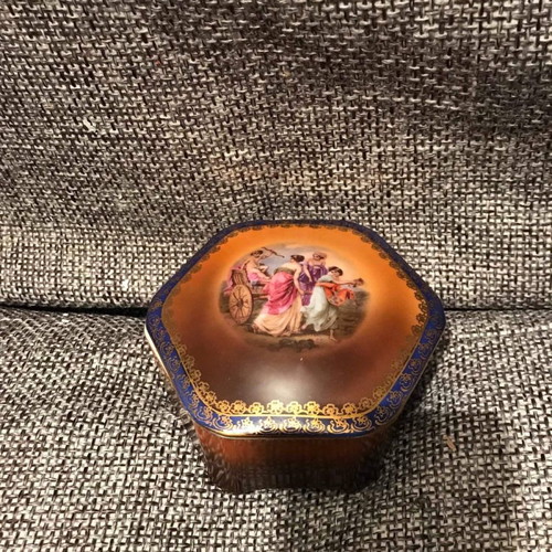 Vintage hexagonal porcelain jewelry box used with mythological design