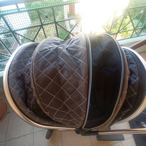 Multifunctional stroller used, foldable in two parts, beige brown gold