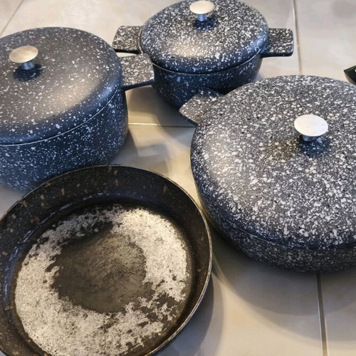 Heavy cookware set used with lids and large frying pan