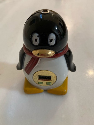 Electronic penguin used with LCD display and buttons