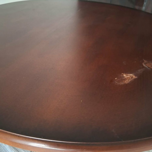 Rotunda table like new with heavy brass base and wooden top