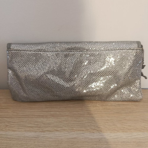 Lollipops bag silver color with decorative wings, like new