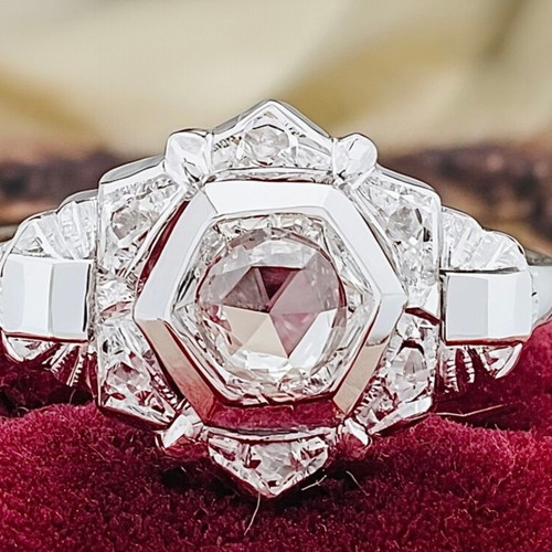 Women's ring with rare natural pink diamonds and 18 ct white gold
