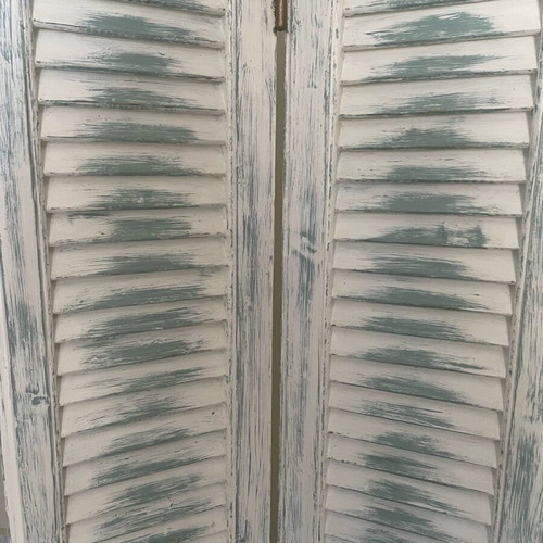 Decorative wooden shutter refurbished with chalk paint colors