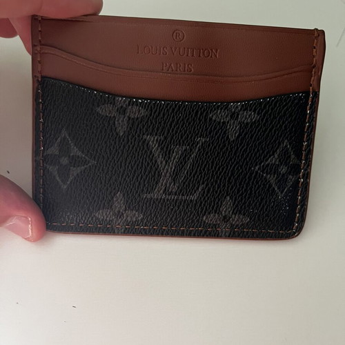 Louis Vuitton leather card holder used, black and brown