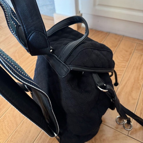 Migato backpack like new, black quilted with blue straps