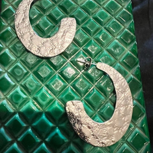 Steel earrings new, silver color